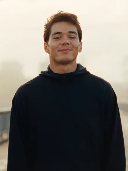 A sportsman in a dark top at the roadside